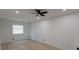 Bedroom featuring wood floors, recessed lighting, ceiling fan and a bright window at 722 Carlson Dr, Orlando, FL 32804