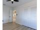 Bright bedroom featuring wood floors, closet and entryway at 722 Carlson Dr, Orlando, FL 32804