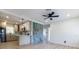 Bright and airy living space featuring recessed lighting, a ceiling fan, and an open-concept kitchen at 722 Carlson Dr, Orlando, FL 32804