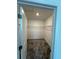 Walk-in closet with carpet and wire shelving at 7717 Stone Creek Trl, Kissimmee, FL 34747