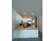 Kitchen with stainless steel appliances, quartz countertops and gray tile floor at 7717 Stone Creek Trl, Kissimmee, FL 34747