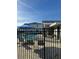 Community pool area with comfortable lounge chairs and a refreshing swimming pool at 7717 Stone Creek Trl, Kissimmee, FL 34747