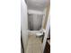 Compact bathroom with shower/tub combo and tiled floor at 7900 S Orange Blossom Trl # 2074, Orlando, FL 32809