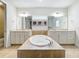 Bathroom with a large soaking tub as a centerpiece at 9071 Woodland Forest Rd, Orlando, FL 32836
