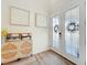 Bright foyer with decorative accents and a view of the front door and hallway at 9071 Woodland Forest Rd, Orlando, FL 32836