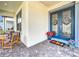 Inviting front entrance with decorative wreaths and seasonal accents, leading to a cozy porch at 9071 Woodland Forest Rd, Orlando, FL 32836