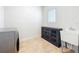 Laundry room complete with utility sink, cabinet, and tile flooring at 9071 Woodland Forest Rd, Orlando, FL 32836
