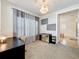 Sitting room with desk and view to bathroom at 9071 Woodland Forest Rd, Orlando, FL 32836
