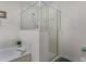 This bathroom has a soaking tub with shower and a glass enclosed shower at 909 Troon Cir, Davenport, FL 33897