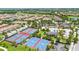 Aerial image of community pools, basketball and tennis courts in a beautiful community at 10067 Mere Pkwy, Orlando, FL 32832