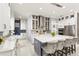 Spacious kitchen featuring a center island with barstool seating and modern appliances at 10067 Mere Pkwy, Orlando, FL 32832