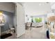 Open-concept living space connects to dining and bath, emphasizing a seamless transition to the outdoor living at 10067 Mere Pkwy, Orlando, FL 32832