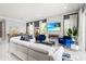 Spacious living room features a sleek fireplace, large TV, and stylish furniture for comfortable living at 10067 Mere Pkwy, Orlando, FL 32832