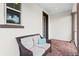 Cozy outdoor patio space with wicker seating and a brick floor at 10067 Mere Pkwy, Orlando, FL 32832