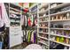 Spacious walk-in closet with custom shelving, providing ample storage for clothing and accessories at 10067 Mere Pkwy, Orlando, FL 32832