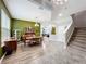 Spacious dining area with modern furnishings, hardwood floors, and an open layout design at 12606 Old Plantation Ln, Orlando, FL 32824