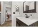 Bathroom featuring new countertop and decorative faucet and access to playroom at 138 Hidden Pointe Ln, Groveland, FL 34736