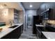 Sleek kitchen featuring modern appliances, ample counter space, and stylish cabinetry, offering a functional cooking area at 14205 Falls Church Dr # 2012, Orlando, FL 32837