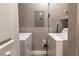 Laundry room featuring a washing machine, a dryer, and utility storage at 14205 Falls Church Dr # 2012, Orlando, FL 32837