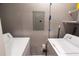 Laundry room with modern appliances and utility storage at 14205 Falls Church Dr # 2012, Orlando, FL 32837