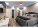 Serene main bedroom with a plush bed, modern lighting, and ample closet space, designed for relaxation and comfort at 14205 Falls Church Dr # 2012, Orlando, FL 32837