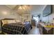 Comfortable bedroom featuring a ceiling fan, a closet with mirrored doors, and neutral decor, providing a relaxing retreat at 1431 Jack Calhoun Dr, Kissimmee, FL 34741