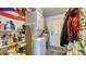 Convenient laundry area equipped with a stacked washer and dryer set, and practical space-saving design at 1431 Jack Calhoun Dr, Kissimmee, FL 34741