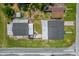 Aerial view of a home and lot showcasing the roof, and yard at 1501 Missouri Ave, St Cloud, FL 34769