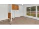 Bright bonus room featuring tile floors, fresh white walls, a ceiling fan, and several windows at 1501 Missouri Ave, St Cloud, FL 34769