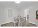 Cozy dining area with seating for four and contemporary decor at 1501 Missouri Ave, St Cloud, FL 34769