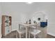 Inviting dining area featuring a four-seat table and barstools, great for entertaining at 1501 Missouri Ave, St Cloud, FL 34769