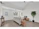 Spacious living room with luxury vinyl flooring, natural light, and modern furnishings at 1501 Missouri Ave, St Cloud, FL 34769