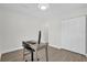 Home office featuring a desk, rolling chair, light hardwood flooring and a closet at 1501 Missouri Ave, St Cloud, FL 34769