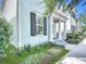 Stylish exterior with manicured landscaping, providing an appealing view of the home's architectural features and curb appeal at 1513 Resolute St, Celebration, FL 34747