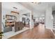 Open floor plan showcasing dining, kitchen, and living areas with modern finishes and ample space at 15540 Blackbead St, Winter Garden, FL 34787