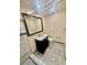 The bathroom has a dark vanity with a marble countertop and a built-in shower at 1720 Foxhall Cir # 1720, Kissimmee, FL 34741
