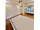 Bedroom featuring hardwood floors, a large closet, and modern lighting at 1720 Foxhall Cir # 1720, Kissimmee, FL 34741