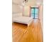 Bedroom featuring wood floors, a modern bed frame, and natural light at 1720 Foxhall Cir # 1720, Kissimmee, FL 34741