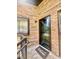 Brick walled entrance of a home featuring a 'Welcome' doormat at 1720 Foxhall Cir # 1720, Kissimmee, FL 34741