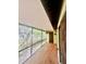 The screened patio has a wooden floor with a railing and an entrance door at 1720 Foxhall Cir # 1720, Kissimmee, FL 34741