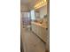 Bathroom featuring double sinks, great lighting, and marble countertops at 1827 Meadow Pond Way, Orlando, FL 32824