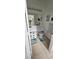 Cozy bathroom with beach-themed decor and white vanity with storage at 1827 Meadow Pond Way, Orlando, FL 32824