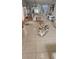 Bright dining area with elegant furnishings and decor and tile floors at 1827 Meadow Pond Way, Orlando, FL 32824