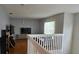 Cozy upstairs living area with large TV and comfortable seating at 1827 Meadow Pond Way, Orlando, FL 32824