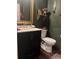 Chic bathroom with a modern vanity and elegant fixtures at 1868 Katz Crossing Dr, Kissimmee, FL 34744