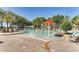 The community pool offers a shallow splash area and plenty of lounge seating at 1868 Katz Crossing Dr, Kissimmee, FL 34744