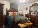 Luxurious main bedroom featuring elegant furniture, and a serene atmosphere at 1868 Katz Crossing Dr, Kissimmee, FL 34744
