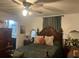 Luxurious main bedroom featuring elegant furniture, and a serene atmosphere at 1868 Katz Crossing Dr, Kissimmee, FL 34744