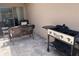 Spacious patio area with grill and outdoor seating, great for entertaining guests at 1868 Katz Crossing Dr, Kissimmee, FL 34744