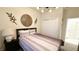 Bedroom featuring a minimalist design, including soft textures and natural light, create a relaxing ambiance at 1875 Spring Shower Cir, Kissimmee, FL 34744